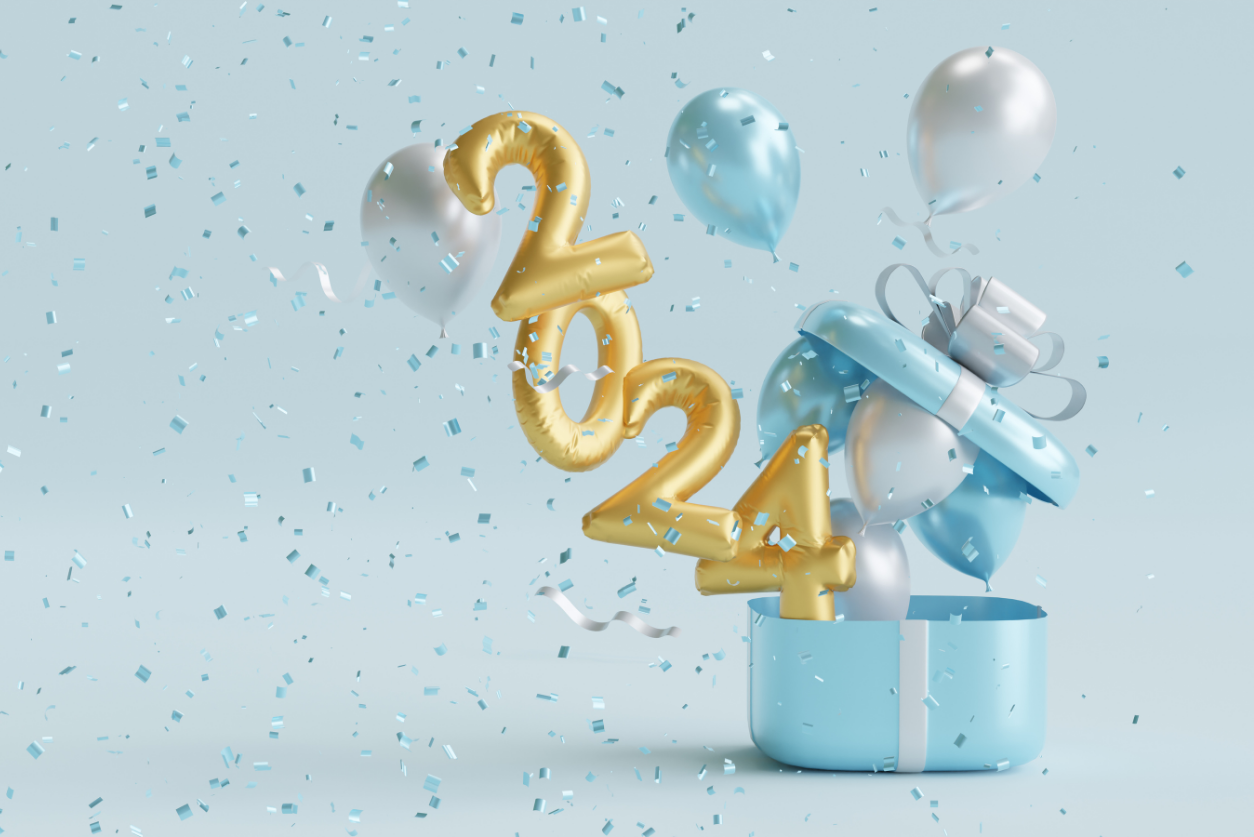 Light blue and white balloons coming up out of a light blue gift box along with 2024 spelled out with gold balloons.