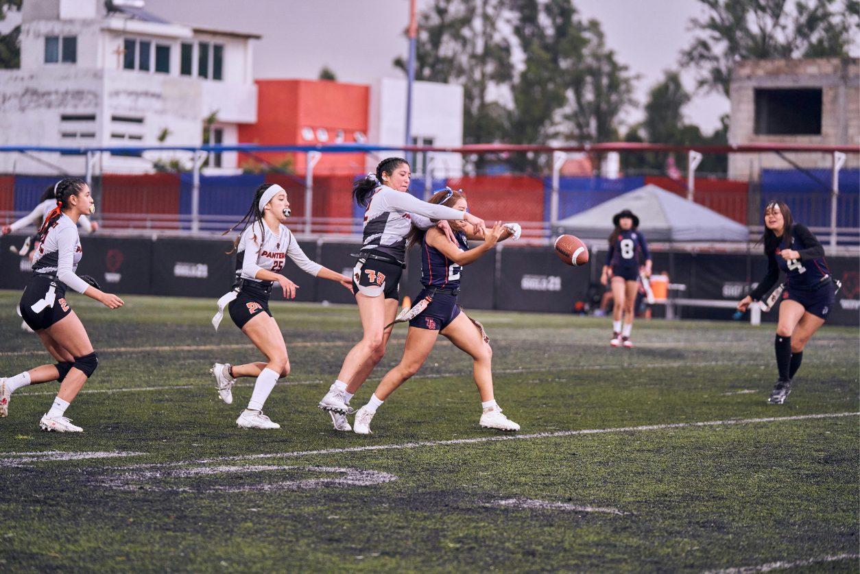 Girls playing rugby